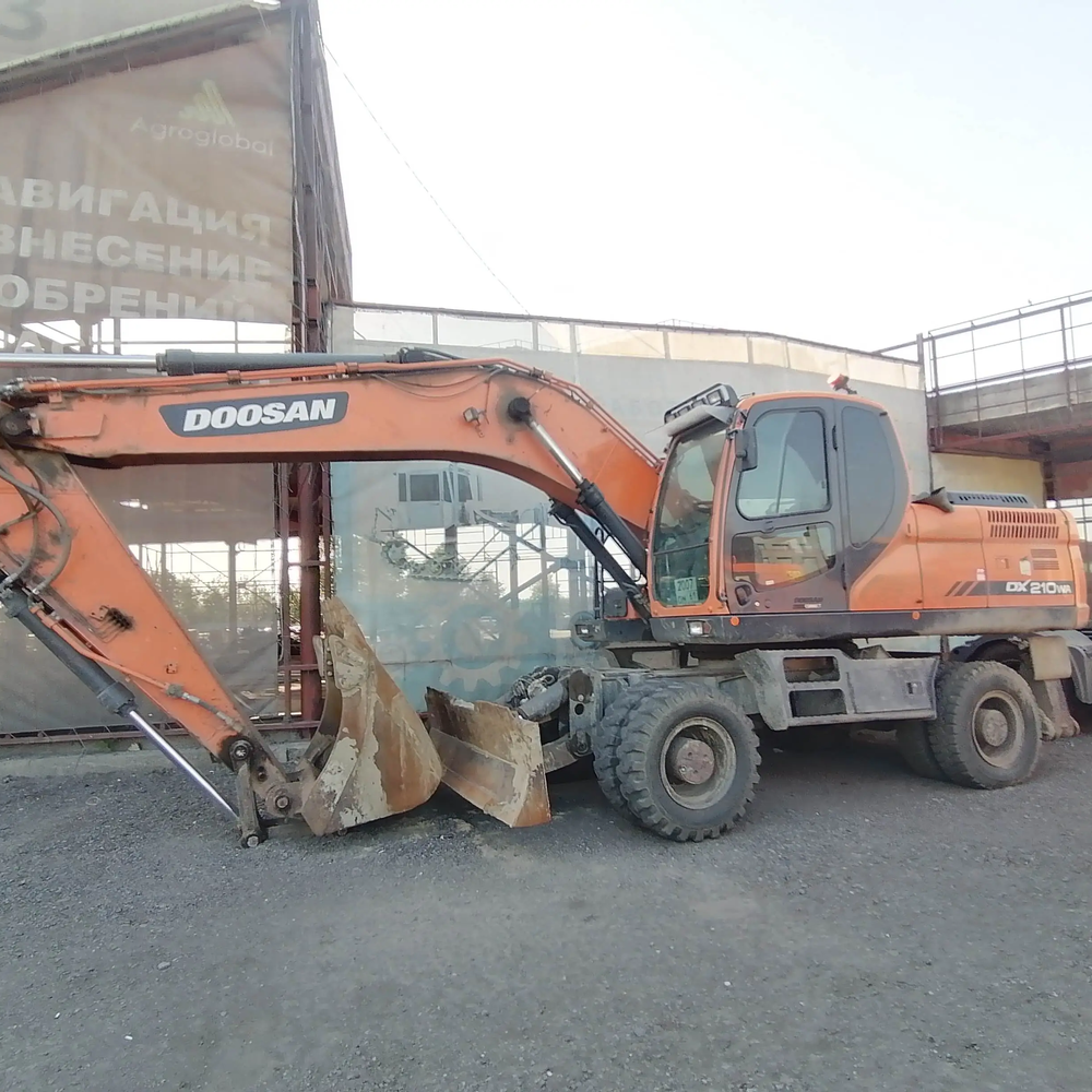 Экскаватор колесный DOOSAN DX210WA