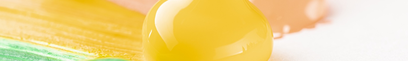 a65b1f48-9ad6-4cd6-a7ab-0c28d8f63c25-close-up-colorful-paint-white-table.jpg